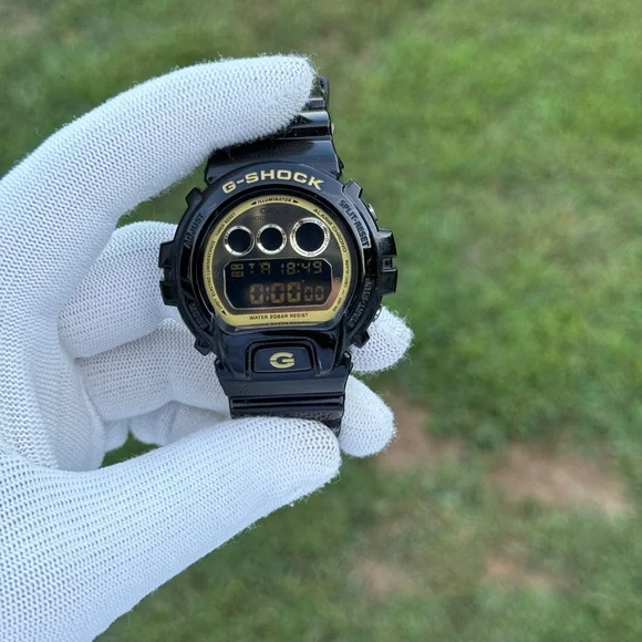 G-SHOCK Black and Gold Digital Watch men’s